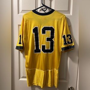 Men’s Nike size, small, authentic Michigan Wolverine football jersey